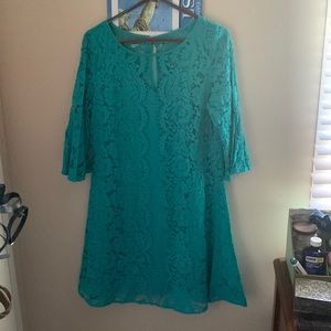 Teal dress, knee length with 1/4 length sleeves. Size: 14 color: teal